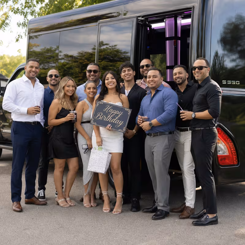 Party bus interior with wraparound leather seating and LED lighting in Seattle