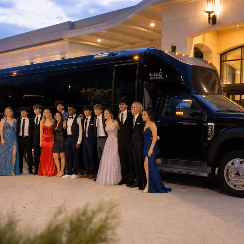 Party bus interior with wraparound leather seating and LED lighting in Seattle
