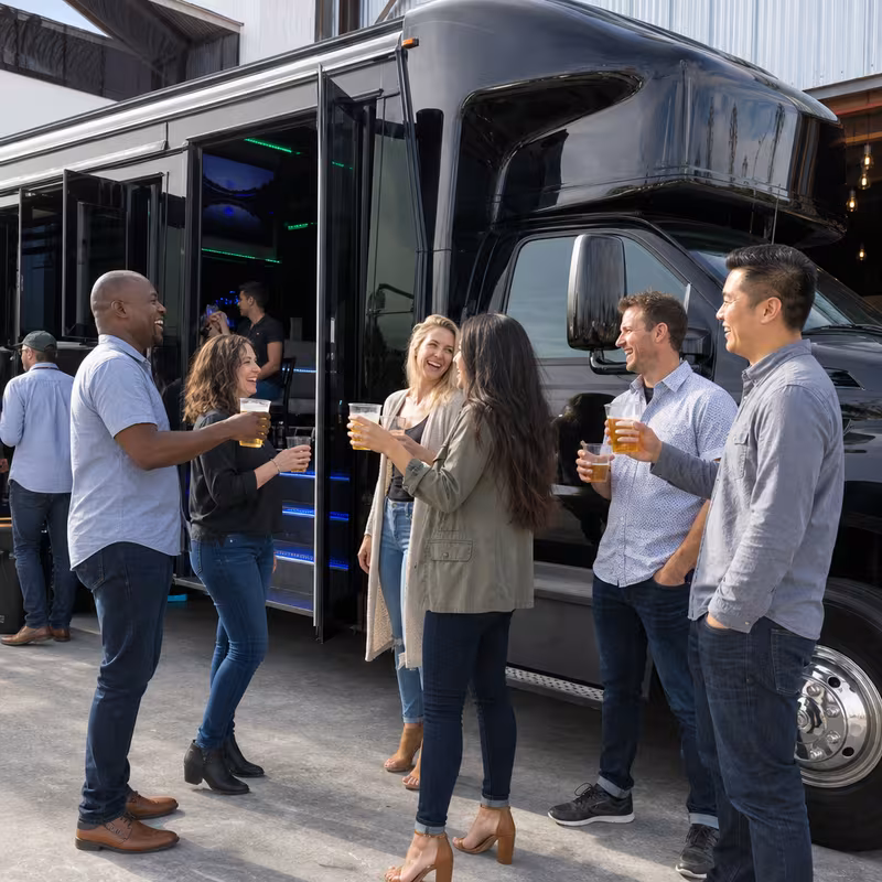 Passengers loading luggage while boarding an Seattle group shuttle